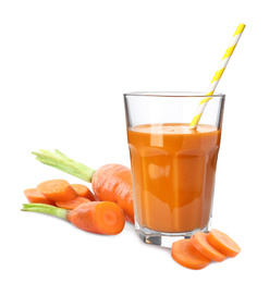 Carrot juice and fresh vegetable on white background