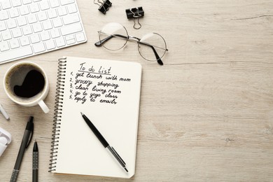 Photo of Flat lay composition with to do list on wooden table, space for text