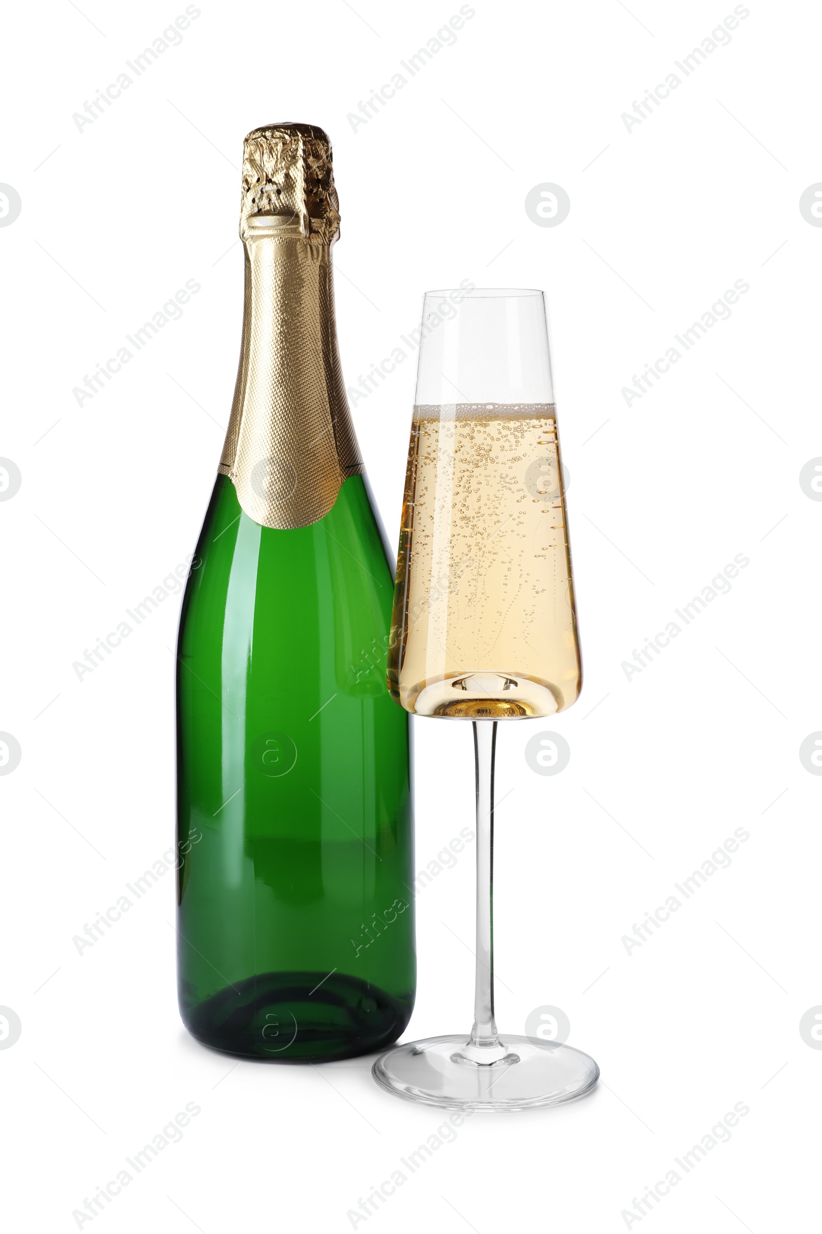 Photo of Bottle and glass with champagne on white background. Festive drink