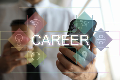 Image of Career opportunities. Man with smartphone indoors, closeup