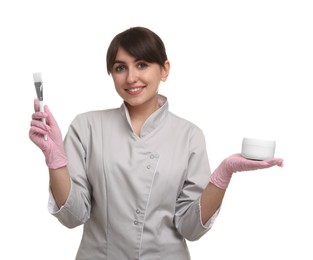 Cosmetologist with cosmetic product and brush on white background