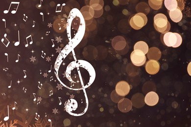 Image of Treble clef, music notes and snowflakes against blurred background, space for text. Bokeh effect