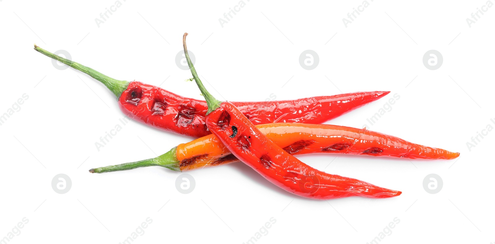 Photo of Tasty grilled chili peppers isolated on white