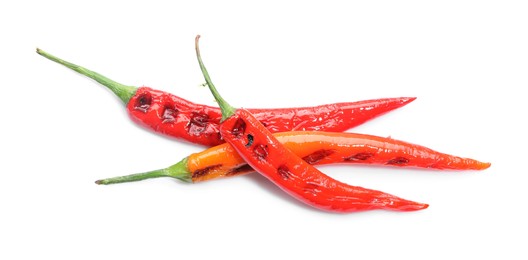 Tasty grilled chili peppers isolated on white