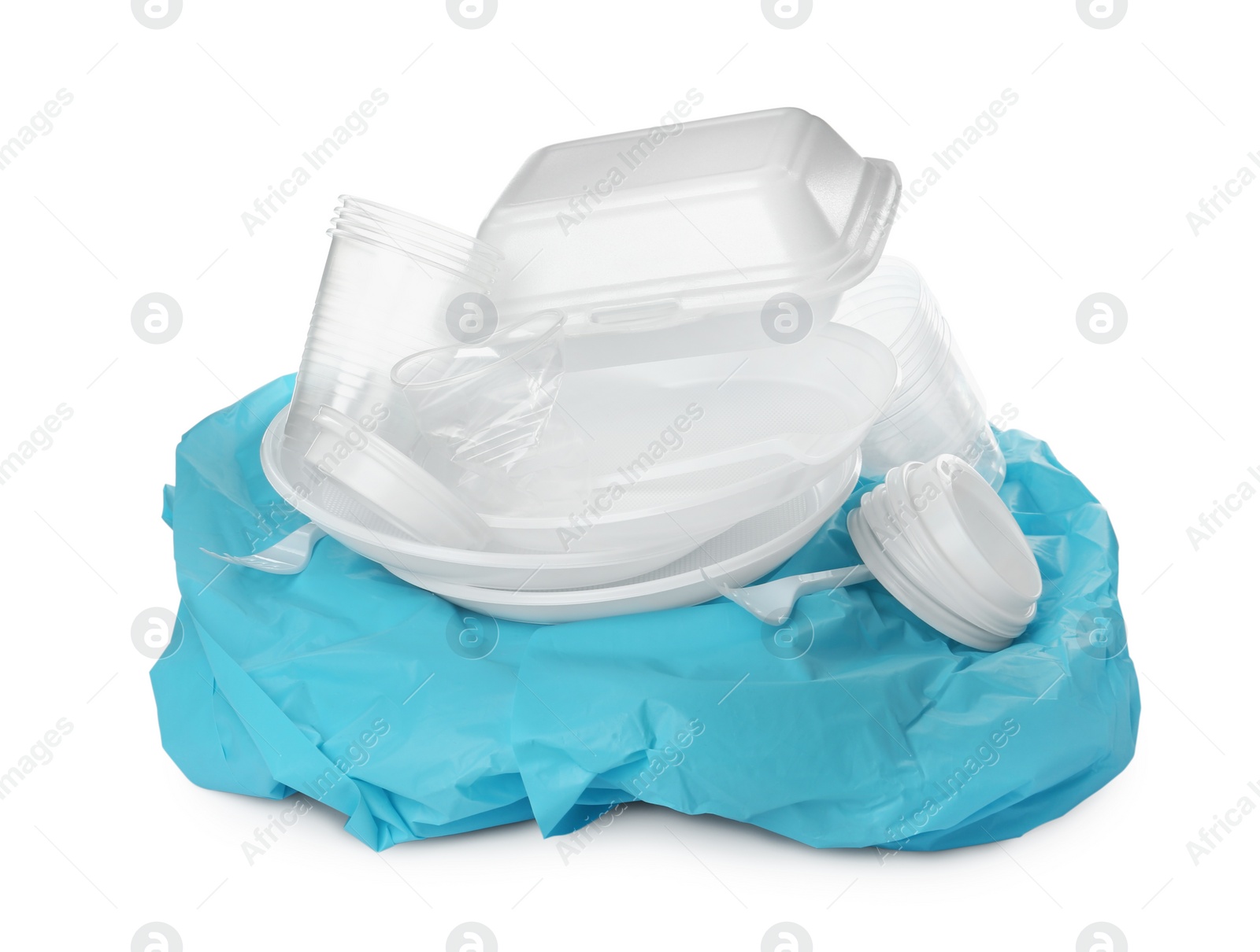 Photo of Pile of different plastic items on white background