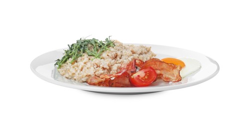 Delicious boiled oatmeal with fried egg, bacon and tomato isolated on white