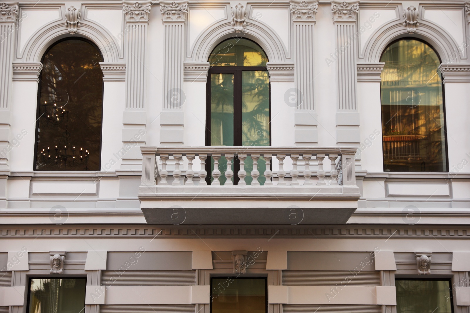 Photo of Exterior of beautiful building with balcony outdoors