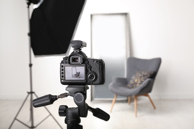 Interior of modern photo studio with professional equipment