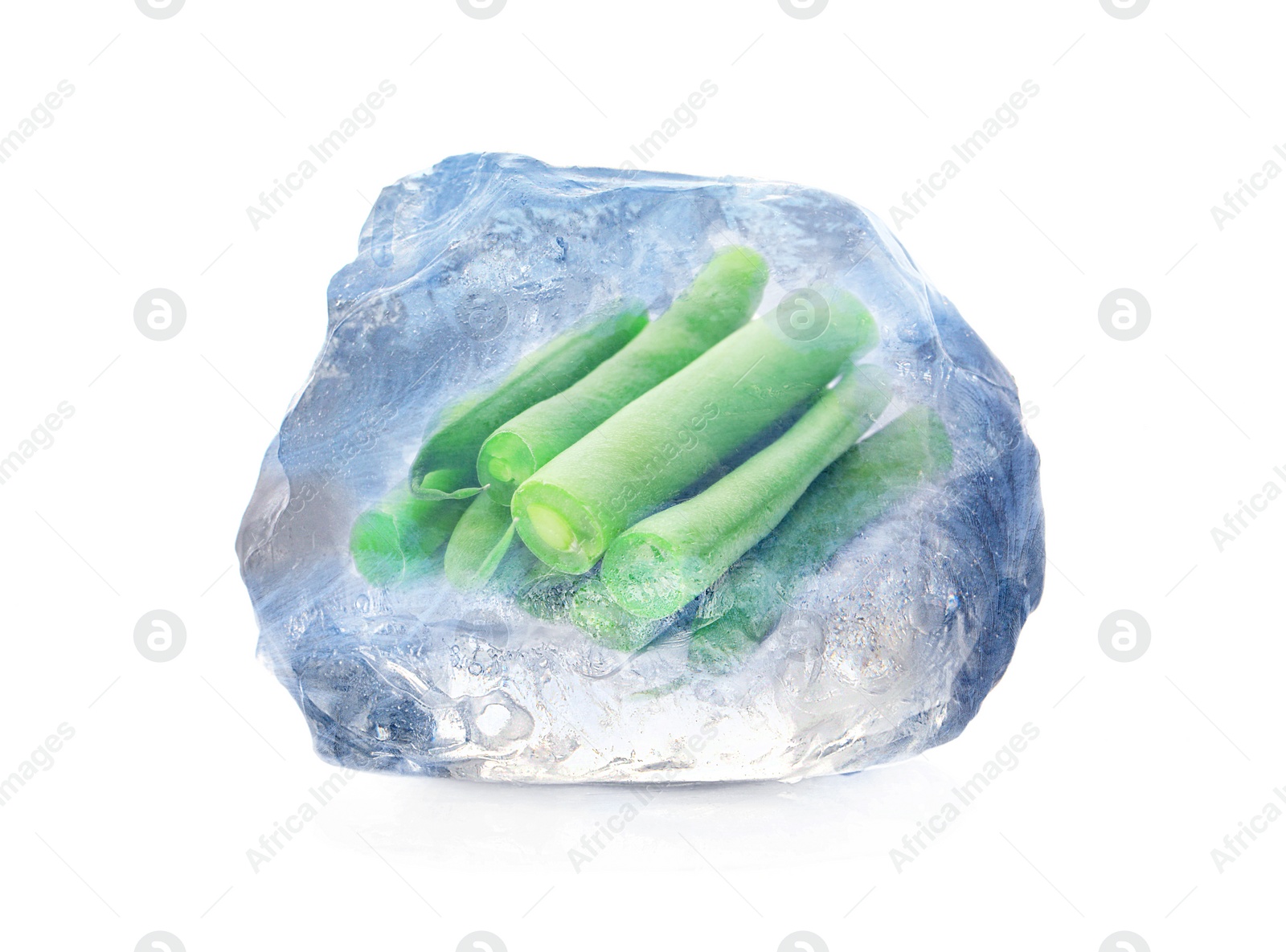 Image of Frozen food. Raw green beans in ice cube isolated on white