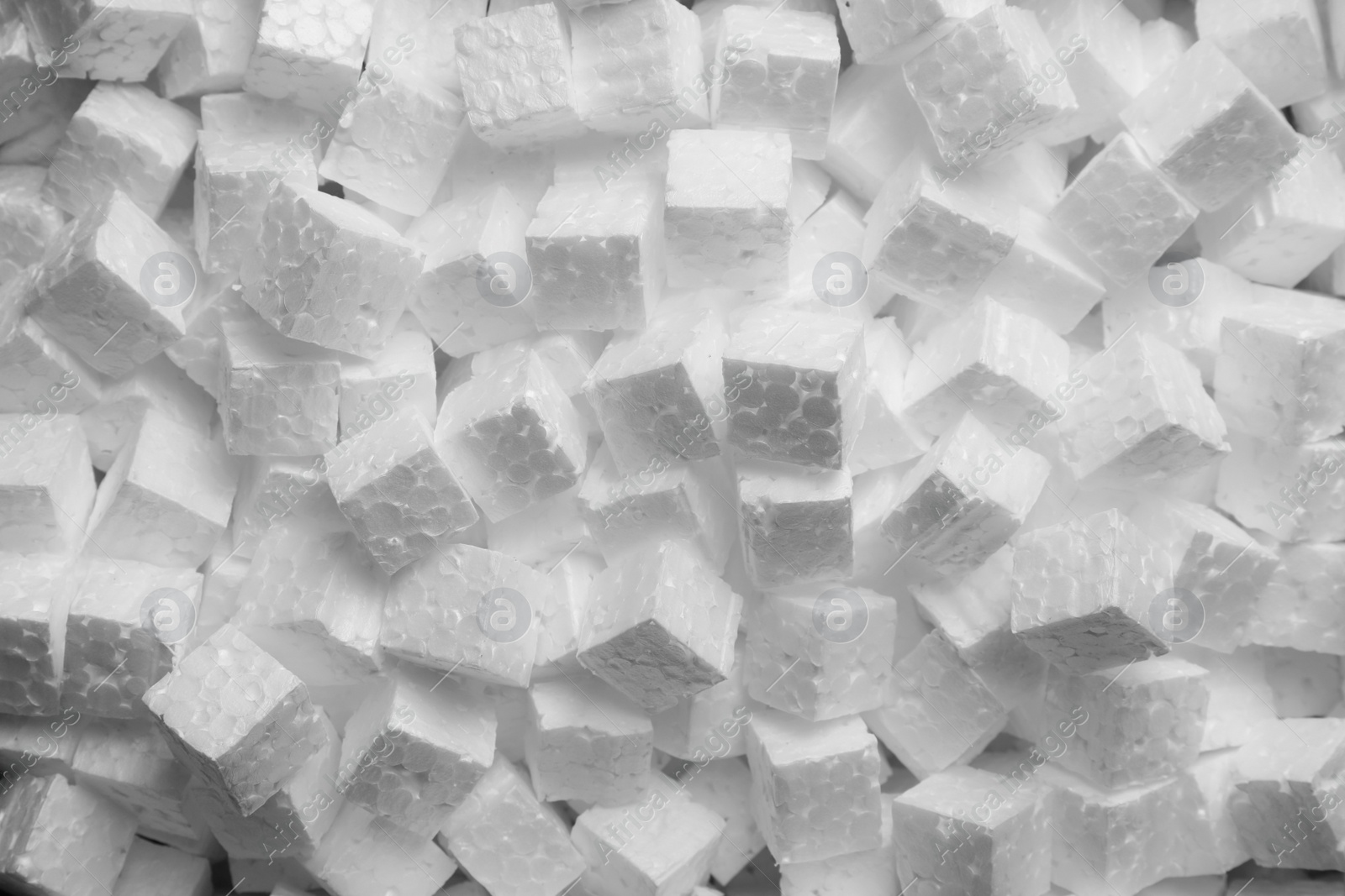 Photo of Polystyrene styrofoam pieces for packaging as background, top view