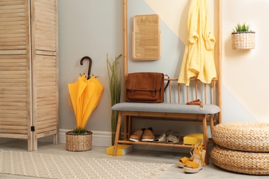 Cozy hallway interior with storage bench and stylish design elements