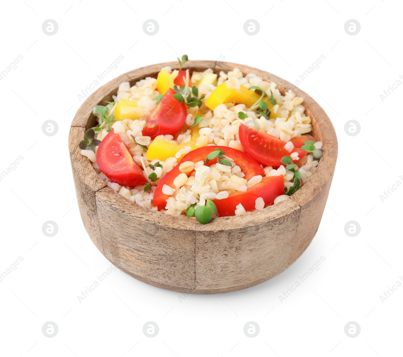 Photo of Cooked bulgur with vegetables in wooden bowl isolated on white