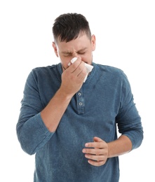 Photo of Man suffering from allergy on white background