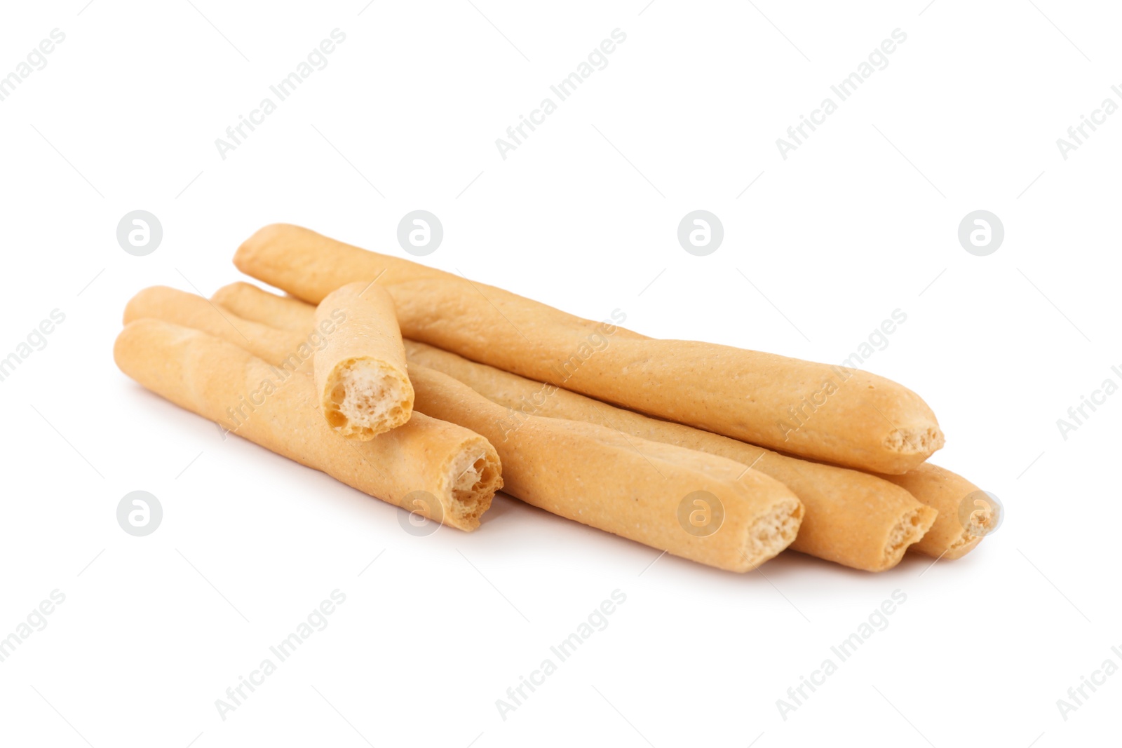 Photo of Fresh delicious grissini sticks on white background