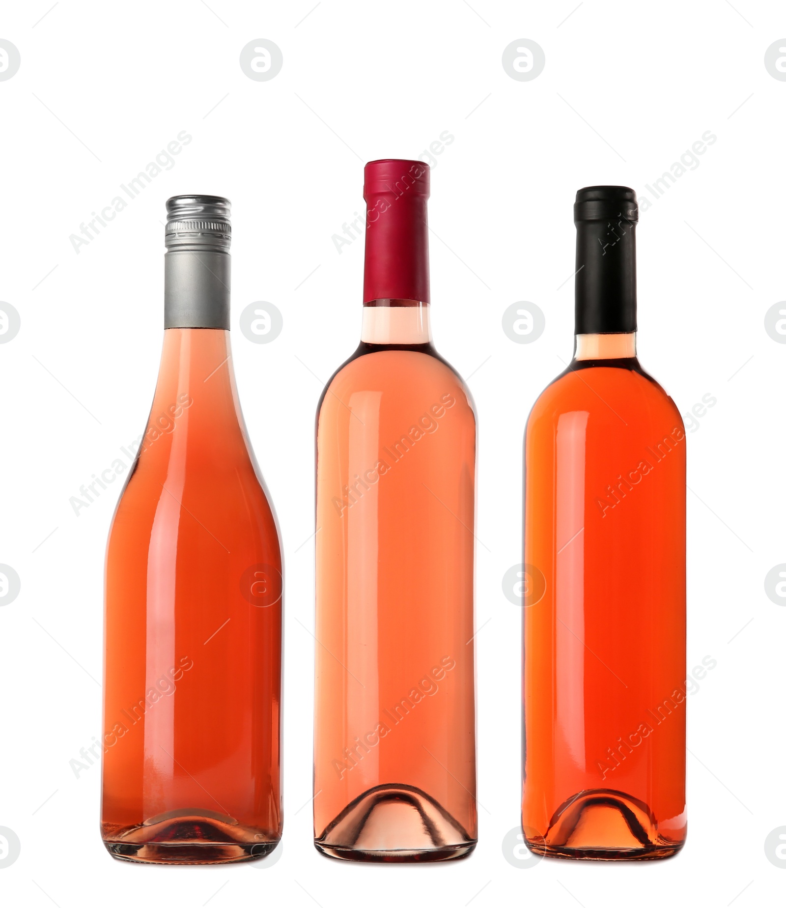 Photo of Bottles of delicious rose wine on white background. Mockup for design