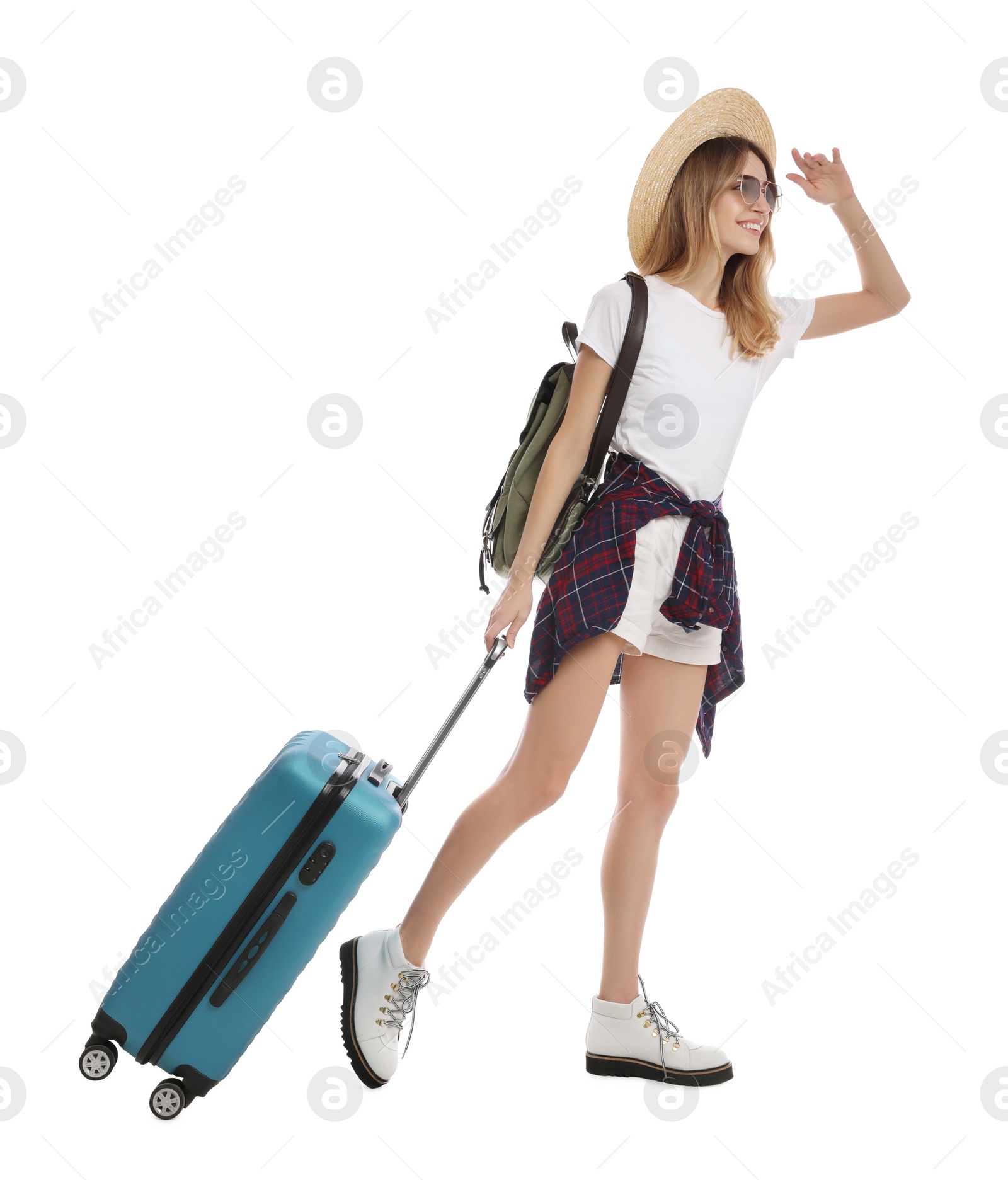 Photo of Woman with suitcase walking on white background. Summer travel