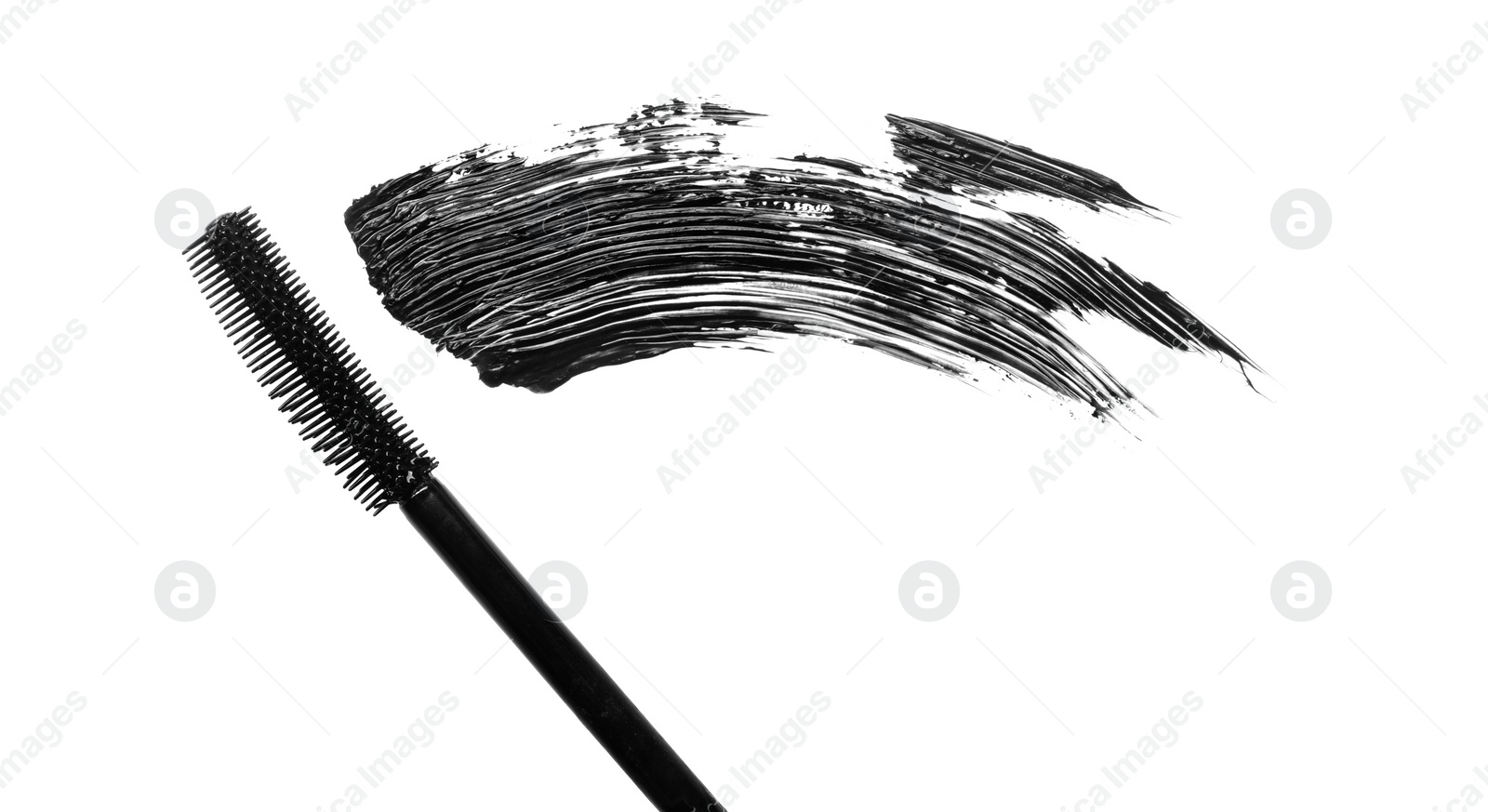 Photo of Smear of black mascara and applicator isolated on white, top view