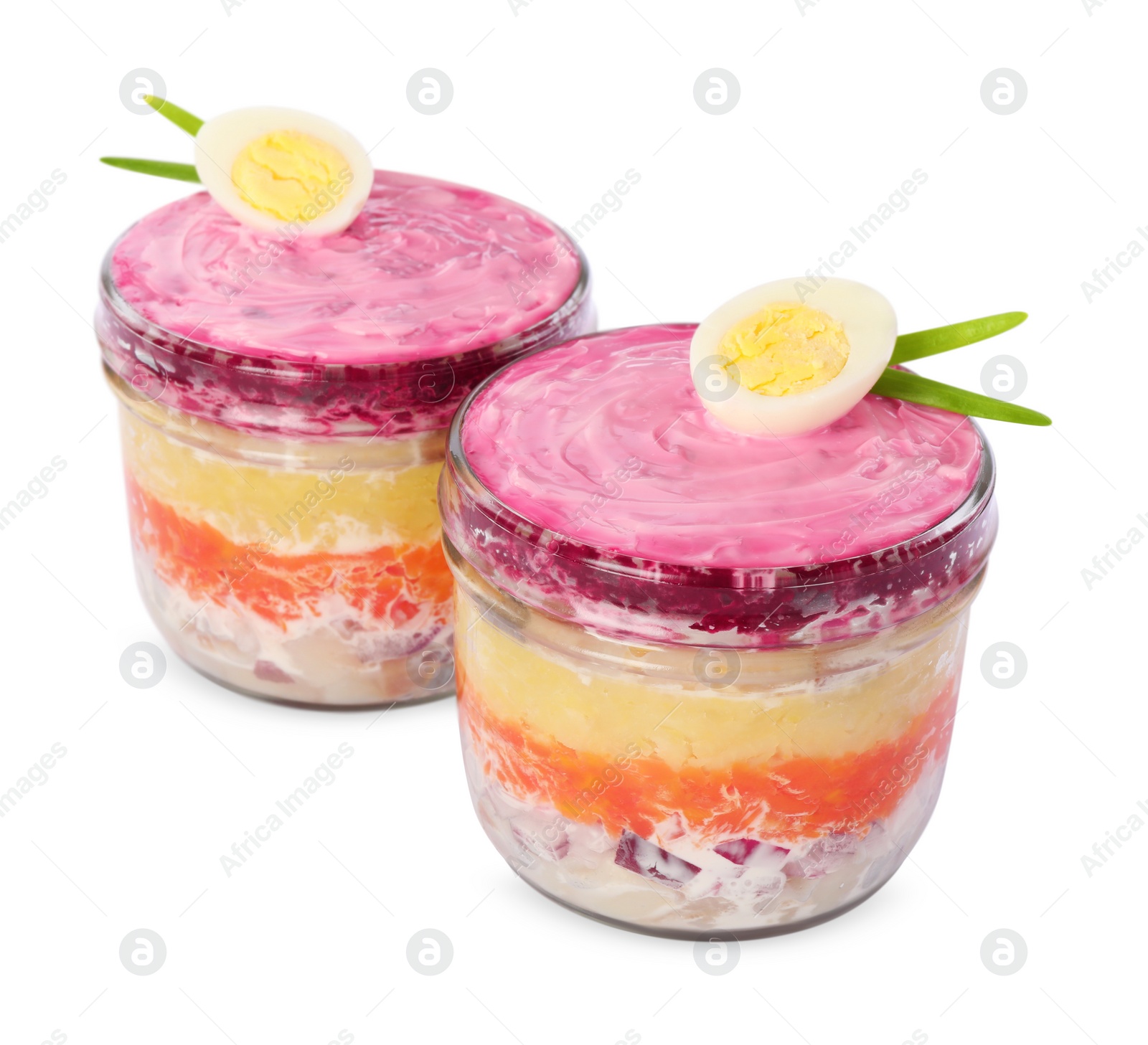 Photo of Jars with herring under fur coat isolated on white. Traditional Russian salad
