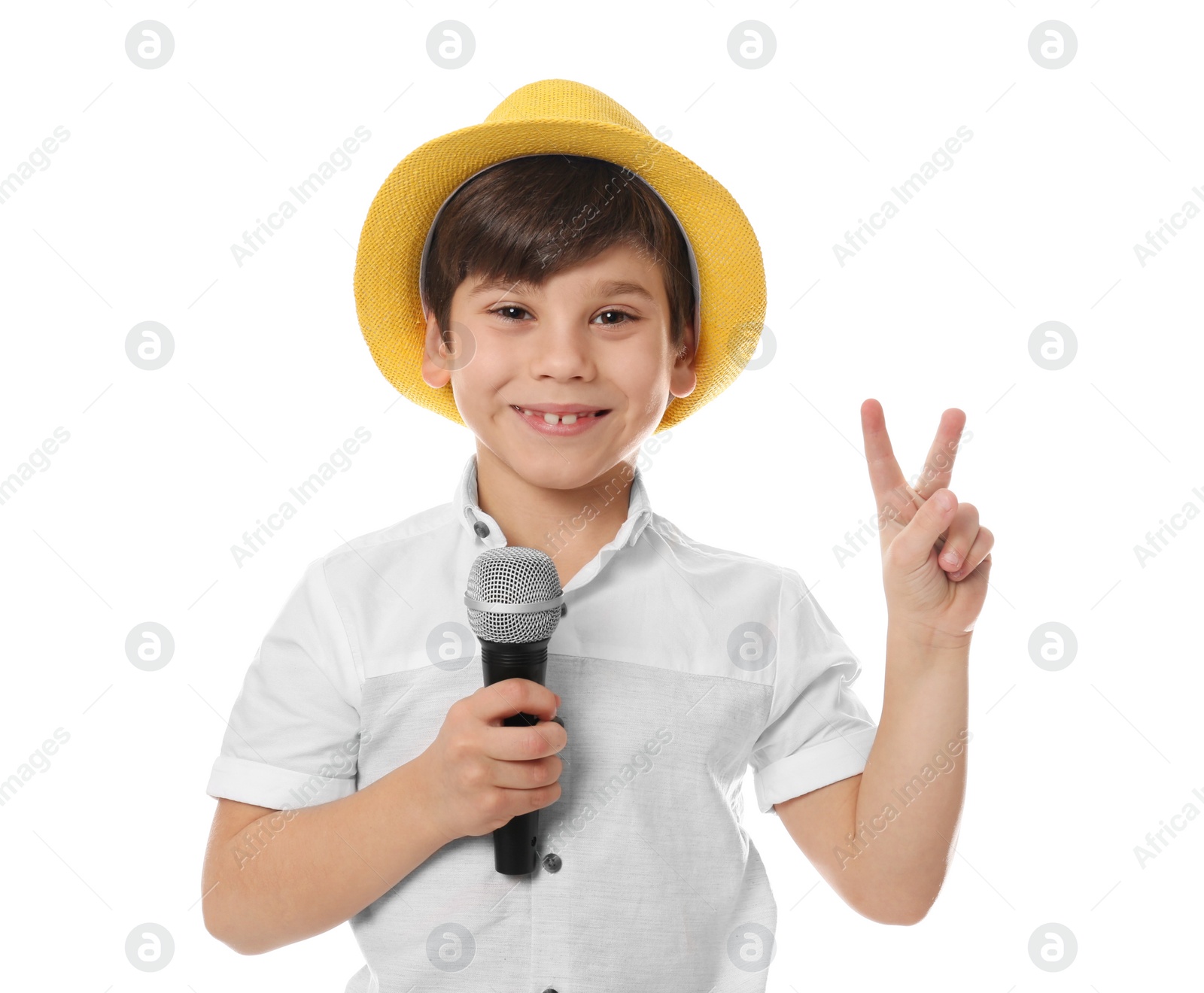 Photo of Cute little boy with microphone on white background