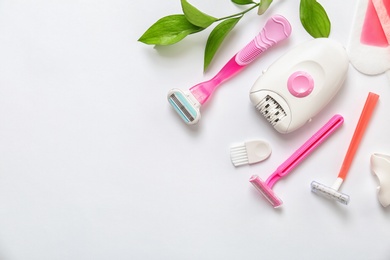 Photo of Set for epilation on white background, flat lay