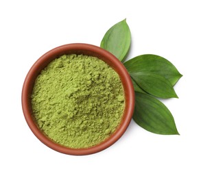 Photo of Henna powder in bowl and green leaves isolated on white, top view