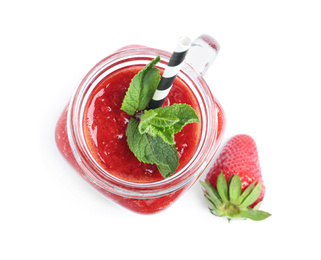 Photo of Tasty strawberry smoothie with mint in mason jar isolated on white, top view