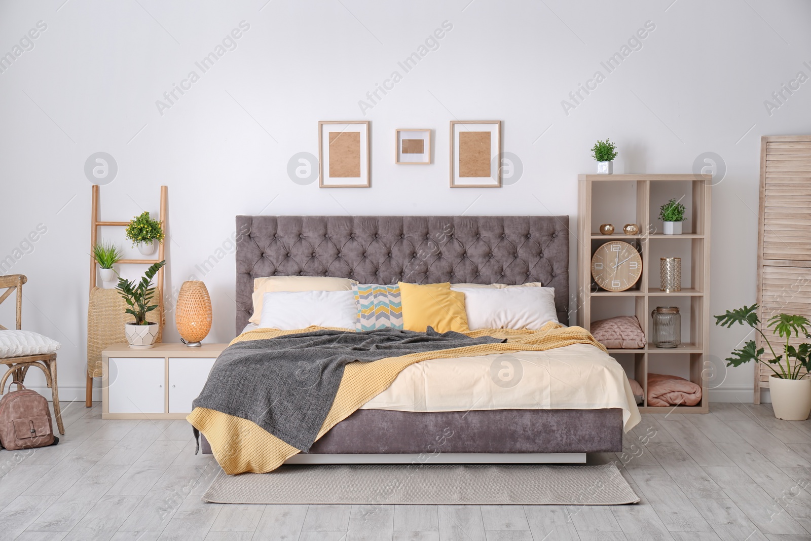 Photo of Bedroom interior with comfortable soft bed