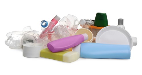 Photo of Pile of plastic garbage on white background