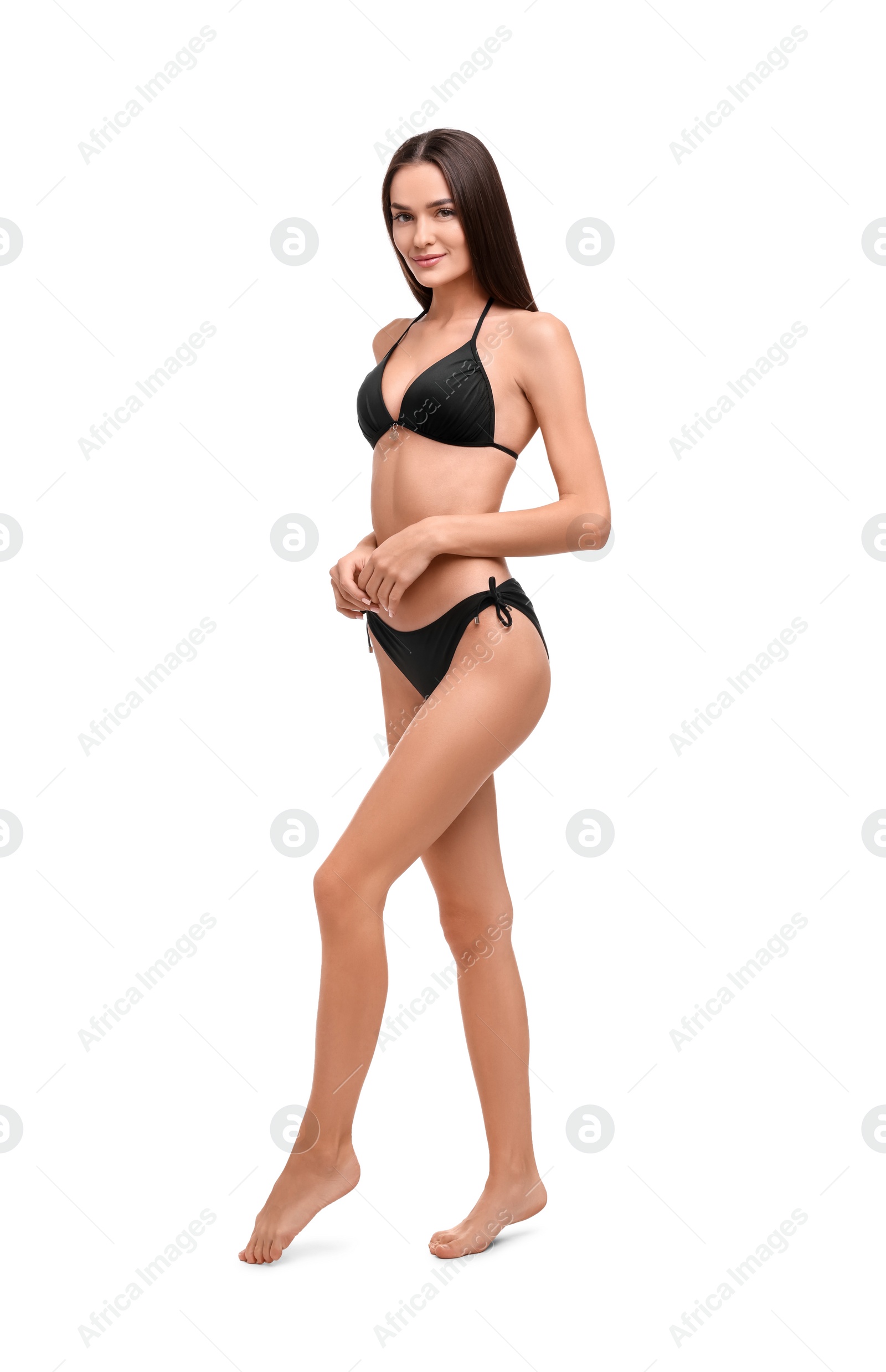 Photo of Young woman in stylish bikini isolated on white