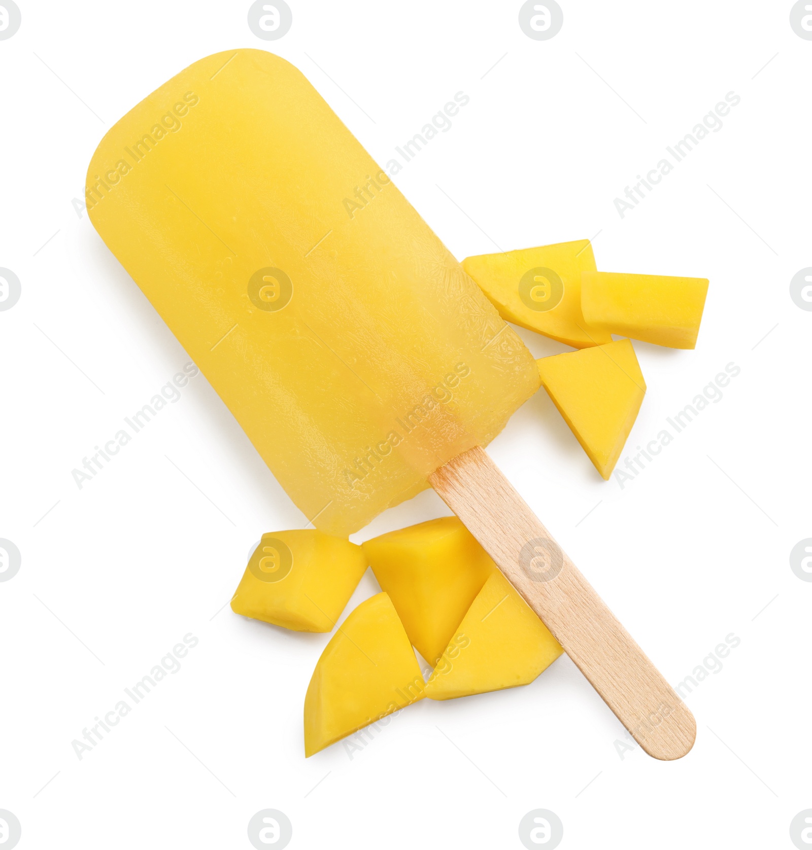 Photo of Tasty mango ice pop isolated on white, top view. Fruit popsicle