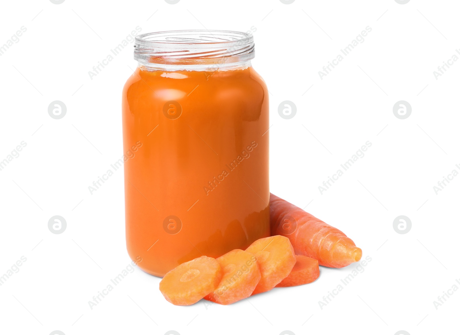 Photo of Jar of healthy baby food and carrot slices on white background