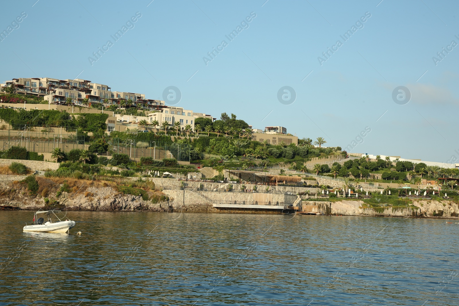 Photo of Picturesque view of sea and shore under blue sky