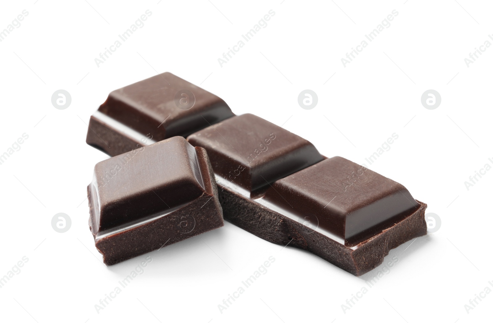 Photo of Pieces of delicious dark chocolate isolated on white