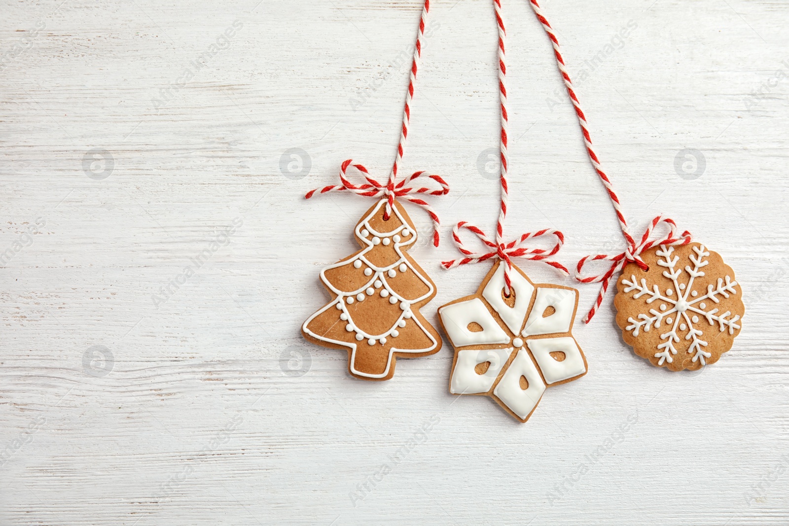 Photo of Tasty homemade Christmas cookies on wooden background