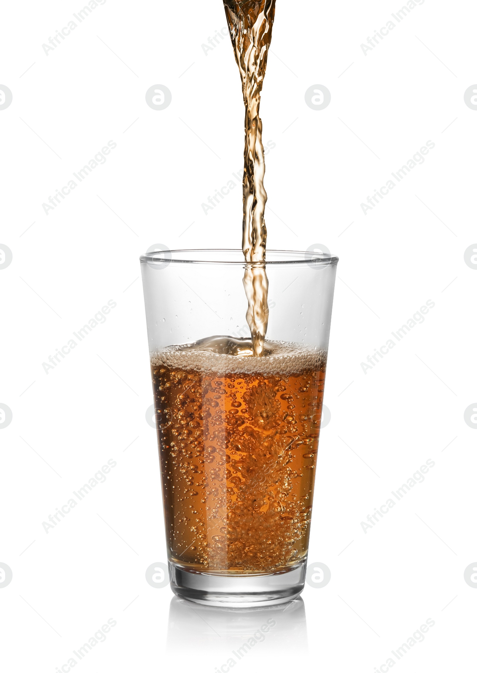 Photo of Pouring fresh juice into glass on white background