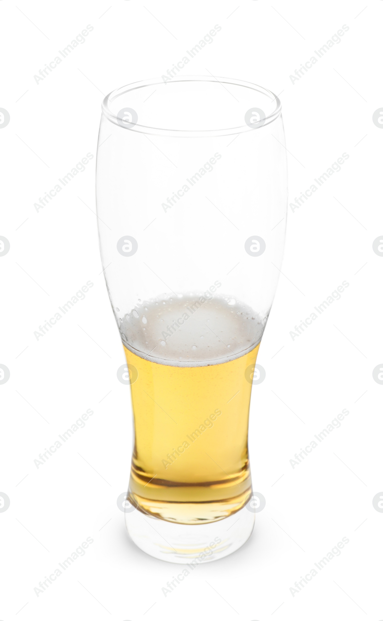 Photo of Half full glass of cold beer isolated on white