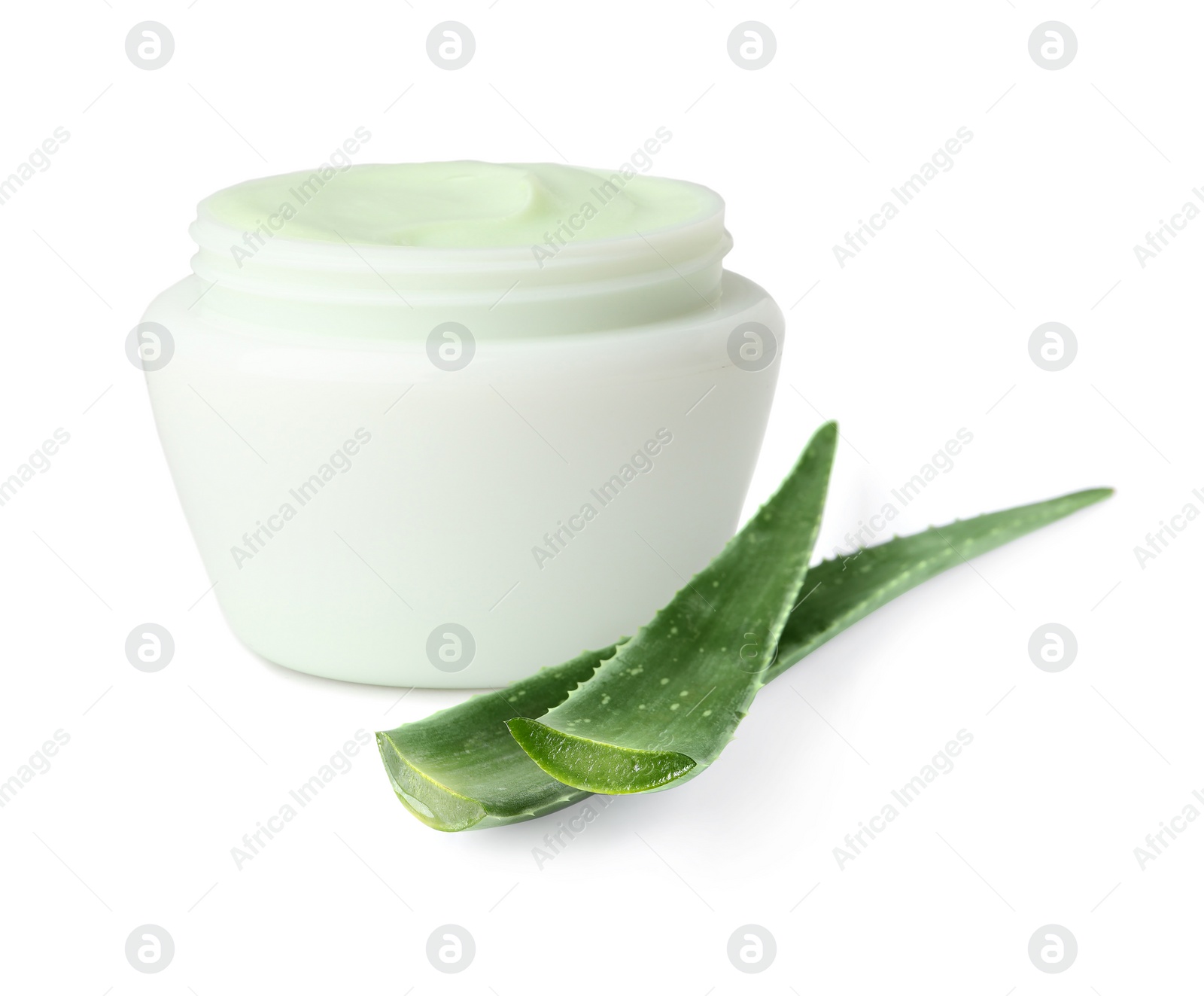 Image of Moisturizing cream with extract of aloe vera. Jar and green aloe leaves on white background