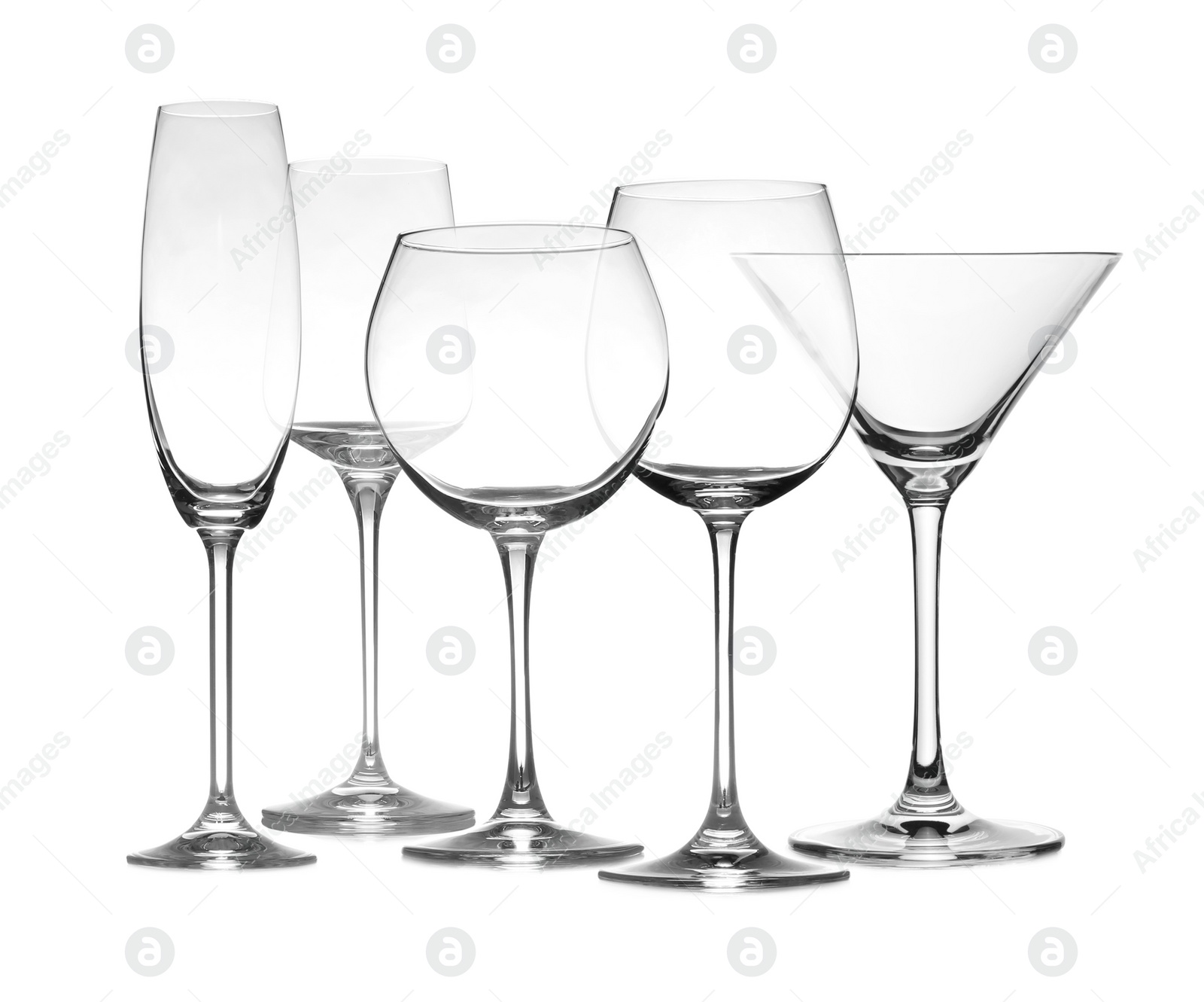 Image of Set of empty glasses on white background