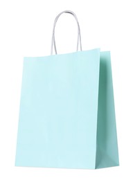 Photo of Turquoise gift paper bag on white background