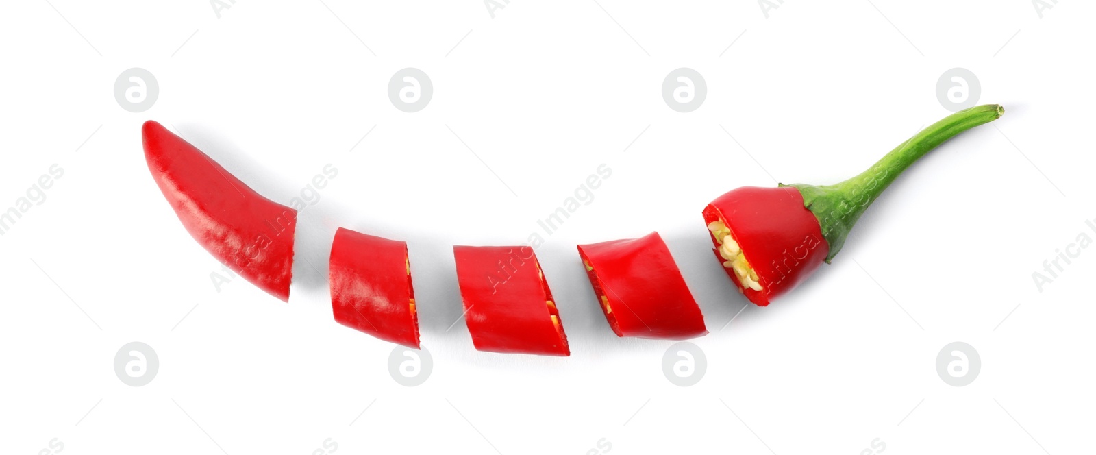 Photo of Cut red chili pepper on white background