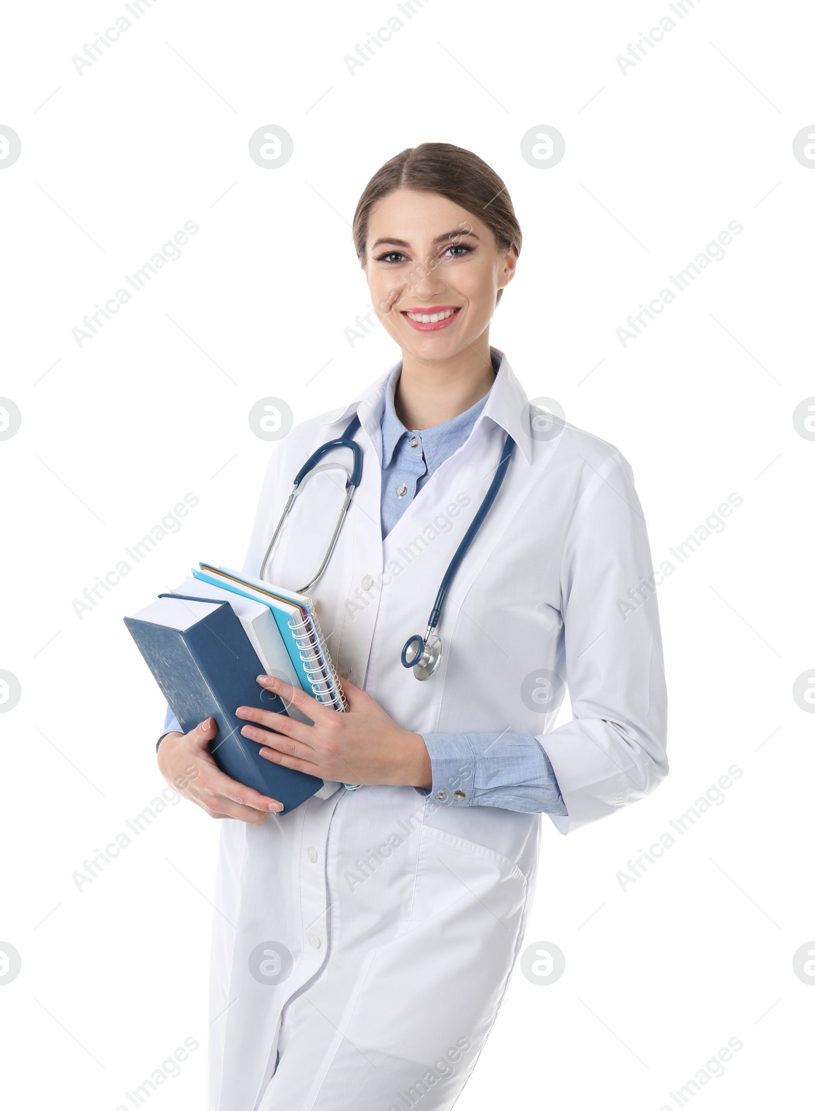 Photo of Young medical student with books on white background