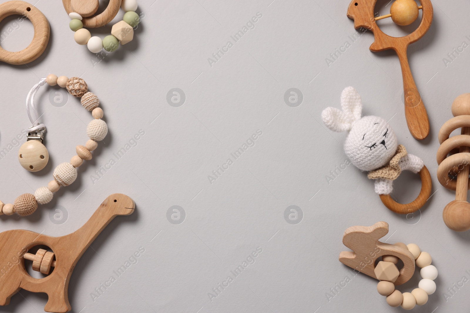 Photo of Different baby accessories on grey background, flat lay. Space for text