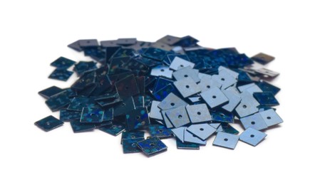 Photo of Pile of dark blue sequins isolated on white