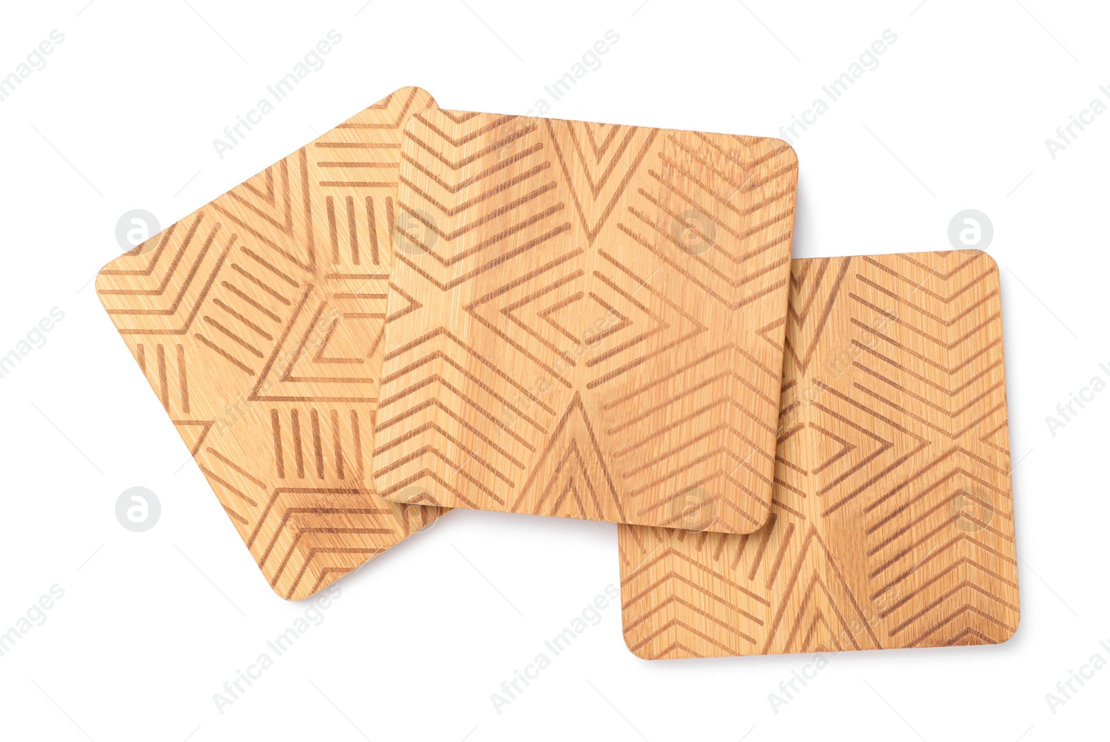 Photo of Stylish wooden cup coasters on white background, top view