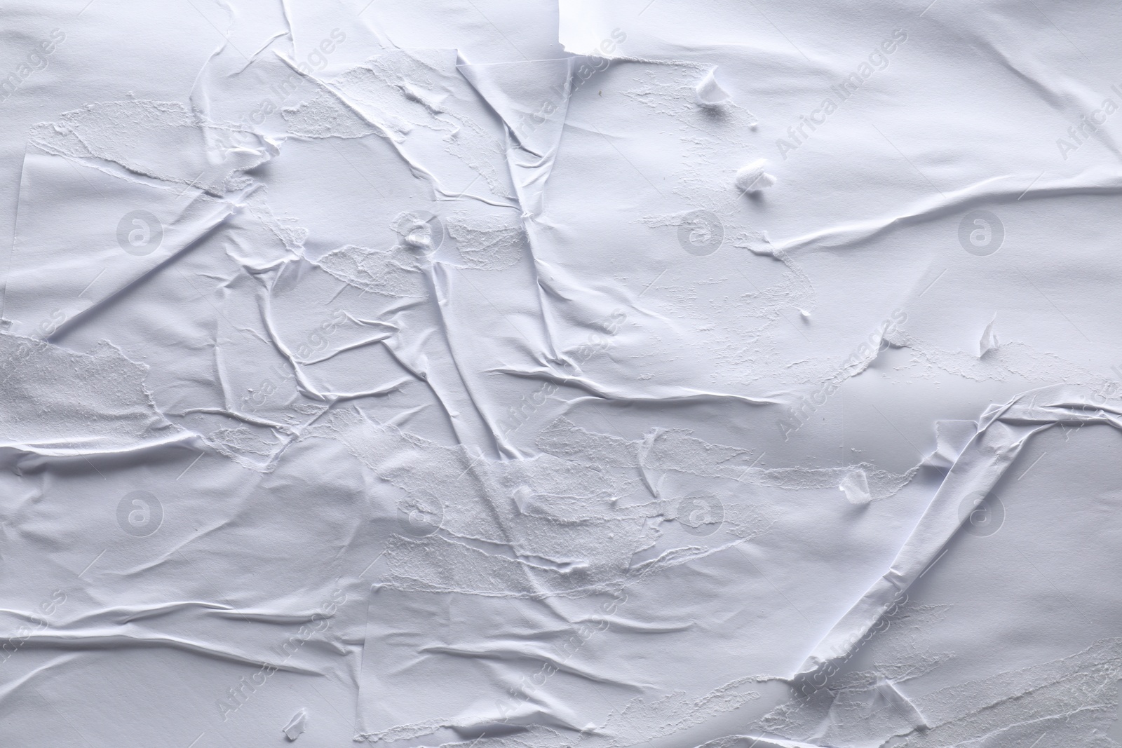 Photo of Texture of white creased paper as background, top view. Wall poster