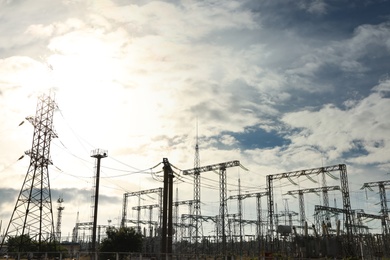 Photo of Modern electrical substation on sunny day, low angle view