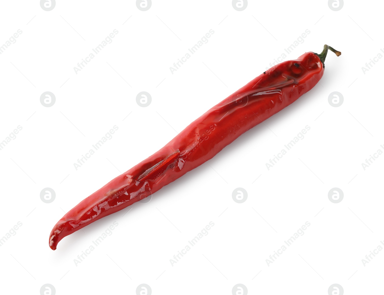 Photo of Grilled red chili pepper isolated on white