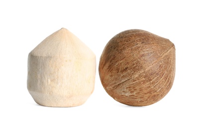 Photo of Fresh ripe whole coconuts on white background