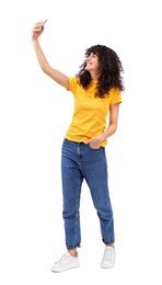 Photo of Beautiful young woman taking selfie on white background