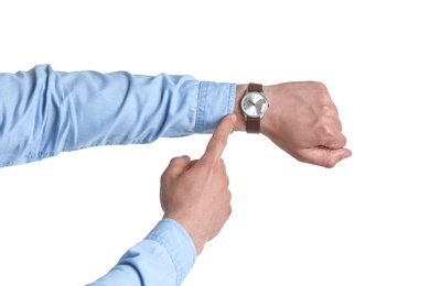 Photo of Young man with wristwatch on white background. Time concept